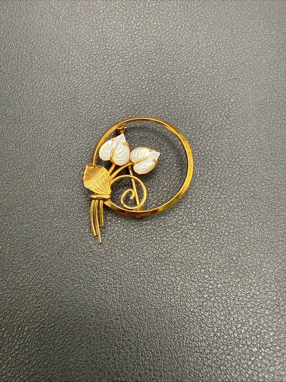 Gold-tone Floral Circle Brooch with White Enamel Accents
